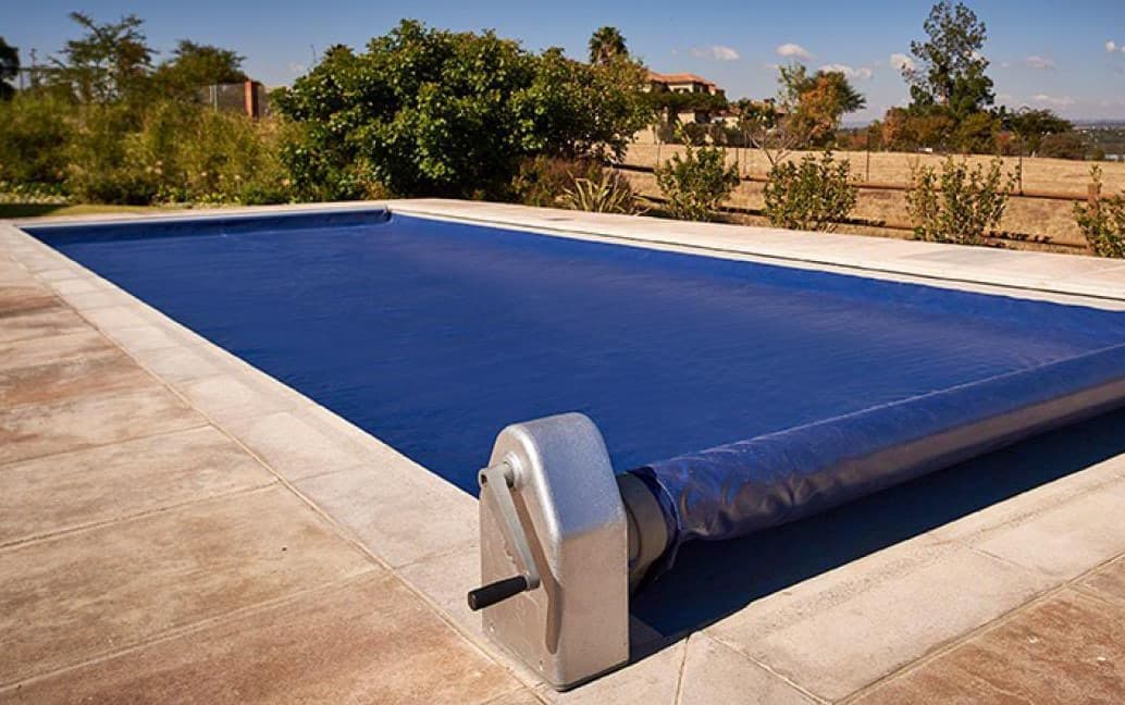 Protective pool cover for maintaining water quality and safety