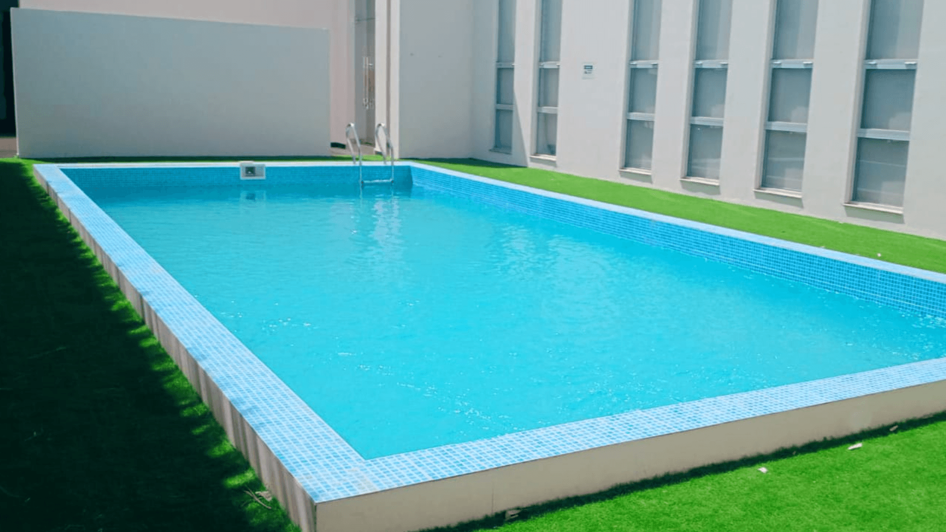 Blue Lagoon Pool Slide 2 - Stunning pool construction and maintenance